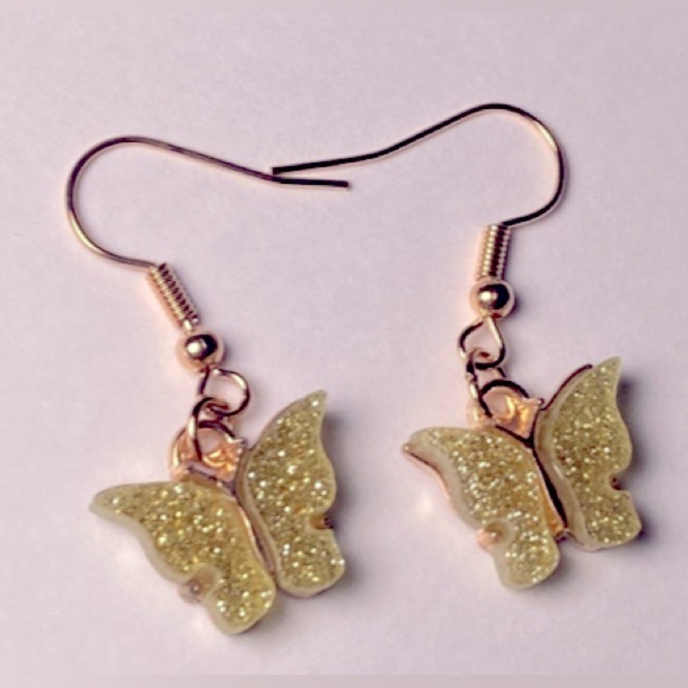 Yellow glittery butterfly earrings